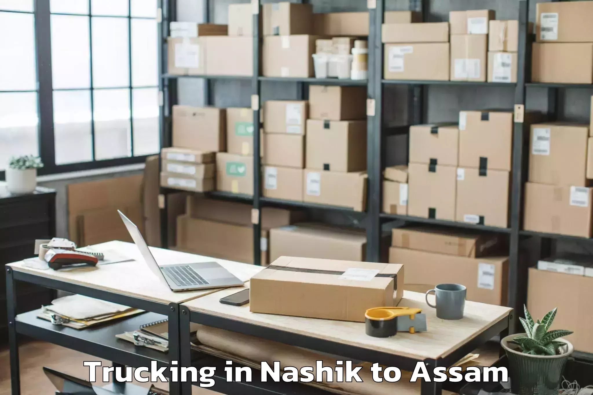 Book Nashik to Sualkuchi Trucking Online